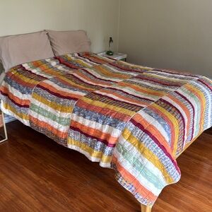 Anthropologie multi colored queen size quilt.